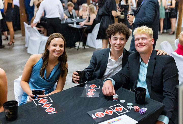 Guests playing Three Card Poker